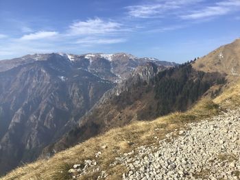 Scenic view of rocky mountains against sky