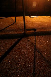 Shadow of illuminated lights on floor