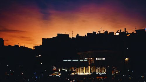 Silhouette of city at night