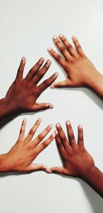 Close-up of hand against white background