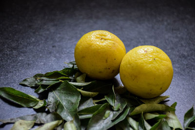 Close-up of oranges on table