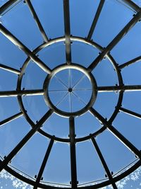 Low angle view of metallic structure against sky