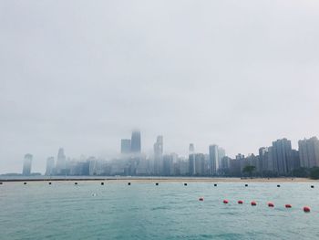 View of buildings in sea