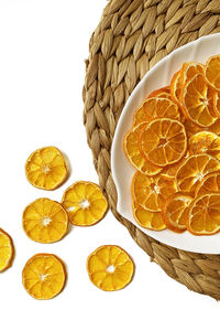 High angle view of oranges on table against white background