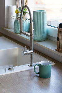 Coffee cup on table at home