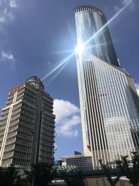 Low angle view of modern buildings against sky