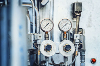 Manometer on industrial equipment. large industrial equipment at plant, pressure in the pipes