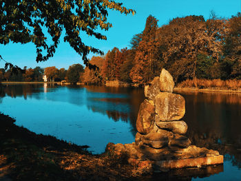 Scenic view of lake against sky during autumn