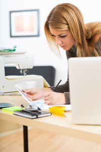 Woman working on table