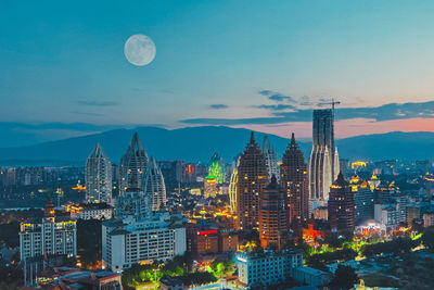 Buildings in city against sky