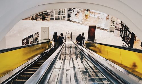 High angle view of people on escalator