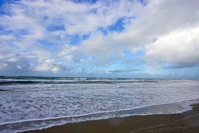 Scenic view of beach against sky
