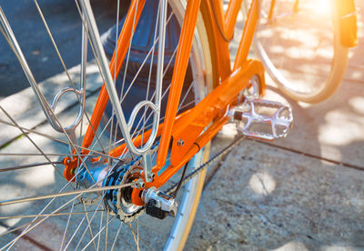 High angle view of bicycle wheel by street