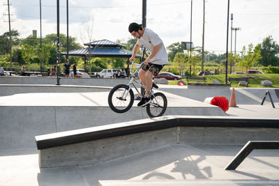 Man riding bicycle in city