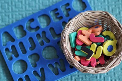 High angle view of candies in basket on table