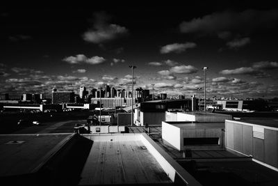 View of city against cloudy sky