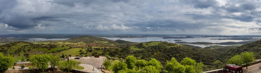 Panoramic view of sea against storm clouds