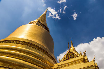 Low angle view of statue of temple against sky