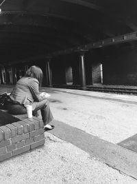 Woman sitting on floor