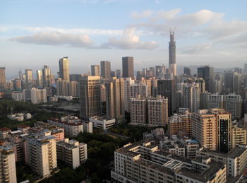 Aerial view of cityscape against sky