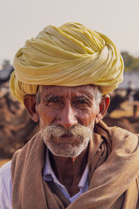 Close-up portrait of senior man wearing turban
