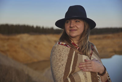 Portrait of woman wearing hat