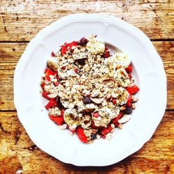 Directly above shot of granola in bowl on table