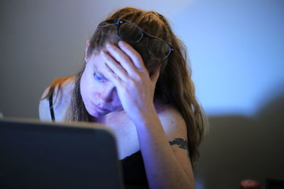 Close-up of woman using mobile phone