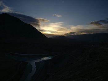 Scenic view of mountains against sky during sunset