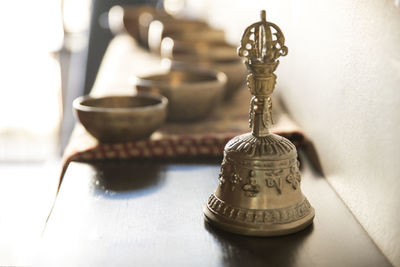 Close-up of tea light candles on table