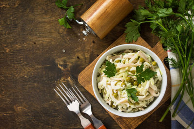 High angle view of salad in bowl on table