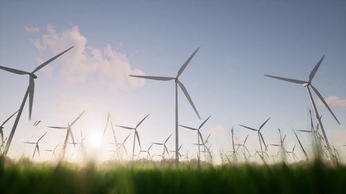 Wind generator grass dawn electric farm technology development windfarm ecology concept 3d render