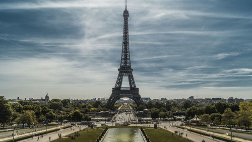 Eiffel tower amidst trees against sky