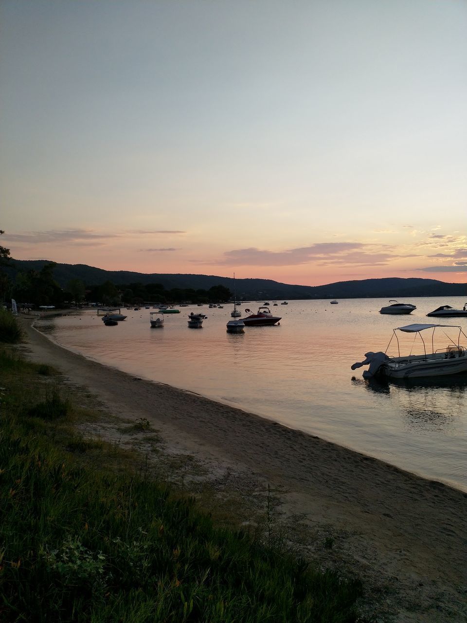 SCENIC VIEW OF SEA AGAINST SKY AT SUNSET