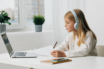 Businesswoman working at desk in office