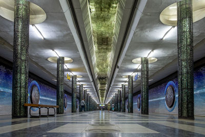 Interior of illuminated subway station