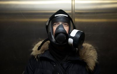 Portrait of man wearing mask