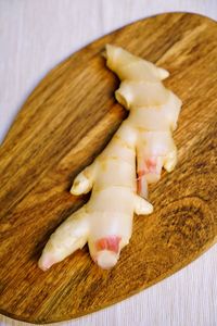 High angle view of bread on cutting board