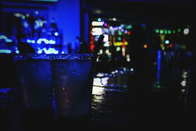 Close-up of illuminated lamp at night