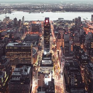 High angle view of illuminated buildings in city