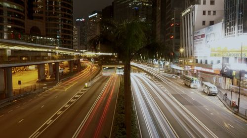 Light trails on city street at night