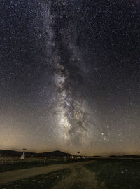 Scenic view of star field against sky at night