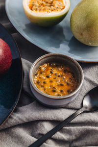 High angle view of fruits in bowl on table