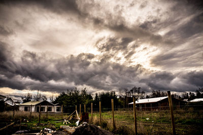 View of landscape against cloudy sky