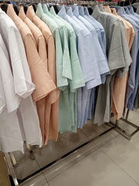 Clothes hanging on rack in store