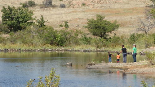 Couple standing in lake