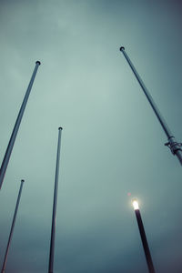 Low angle view of street light against sky