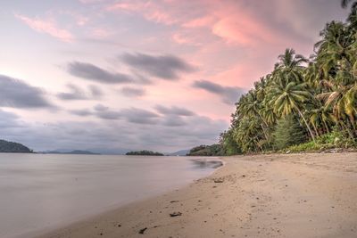 Scenic view of sea against cloudy sky