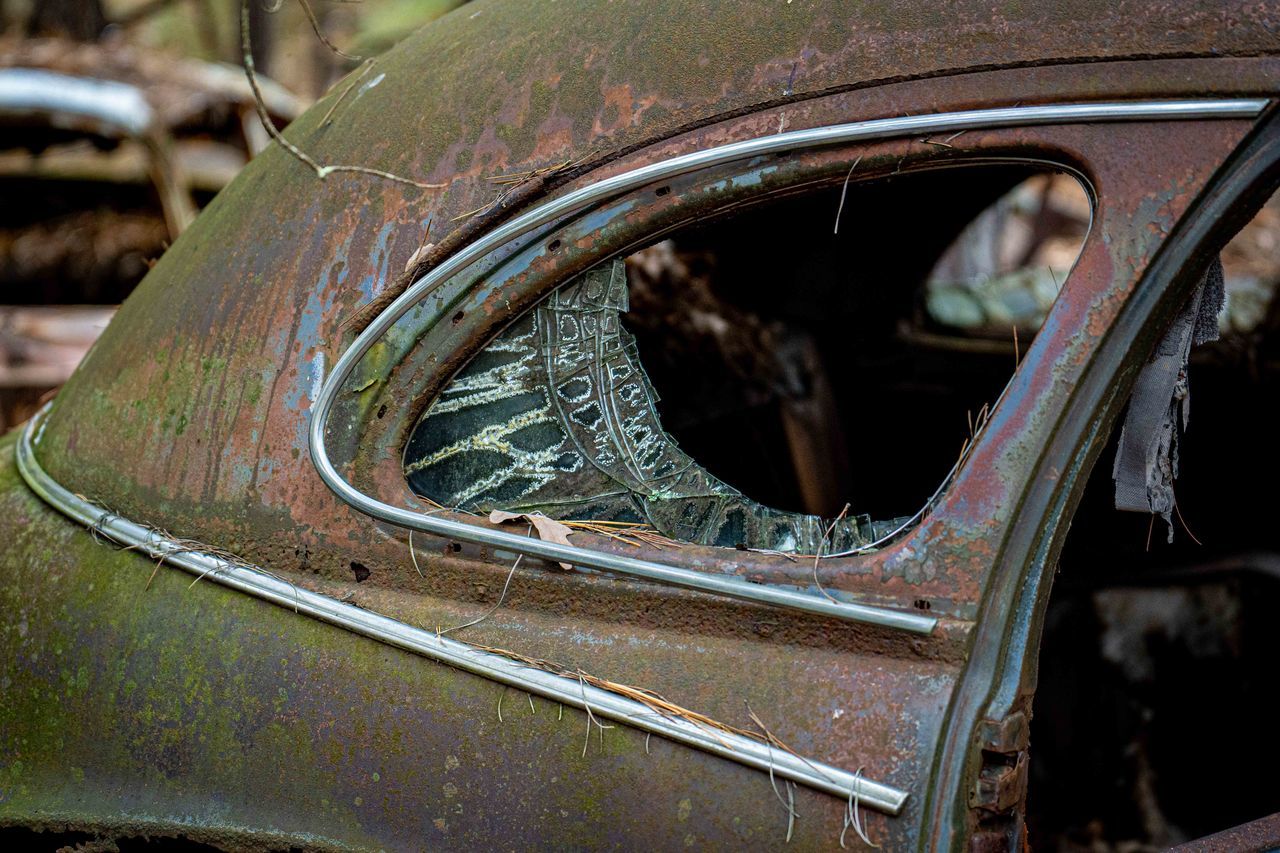 car, mode of transportation, motor vehicle, damaged, vehicle, transportation, abandoned, rundown, land vehicle, broken, decline, deterioration, vintage car, rusty, metal, automobile, old, wheel, bad condition, no people, day, automotive exterior, close-up, retro styled, focus on foreground, glass, weathered, ruined, antique car, outdoors, destruction