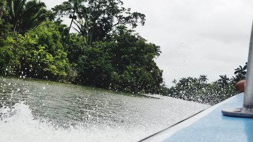 Wet road seen through car windshield